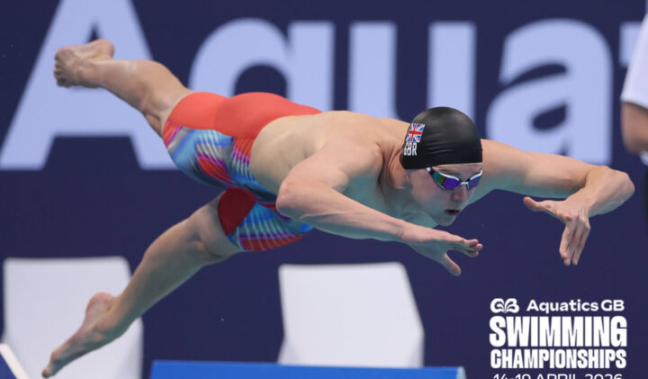 A competitive swimmer executes a powerful dive during the Aquatics GB Swimming Championships, showcasing athleticism and determination.